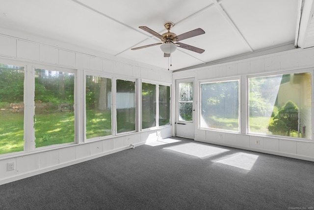 unfurnished sunroom with ceiling fan and lofted ceiling