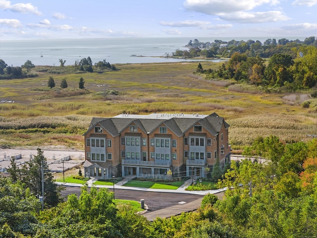 bird's eye view with a water view