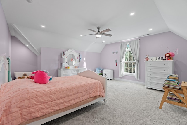 carpeted bedroom with vaulted ceiling and ceiling fan