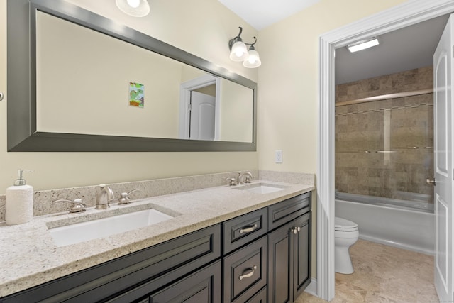 full bathroom with vanity, toilet, and bath / shower combo with glass door