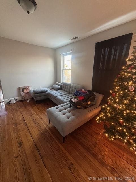 living area with wood-type flooring