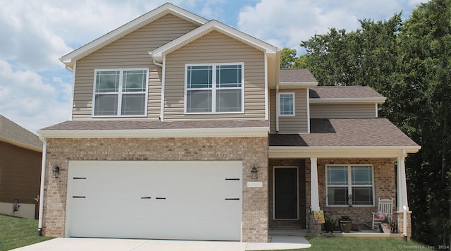 craftsman inspired home with a garage