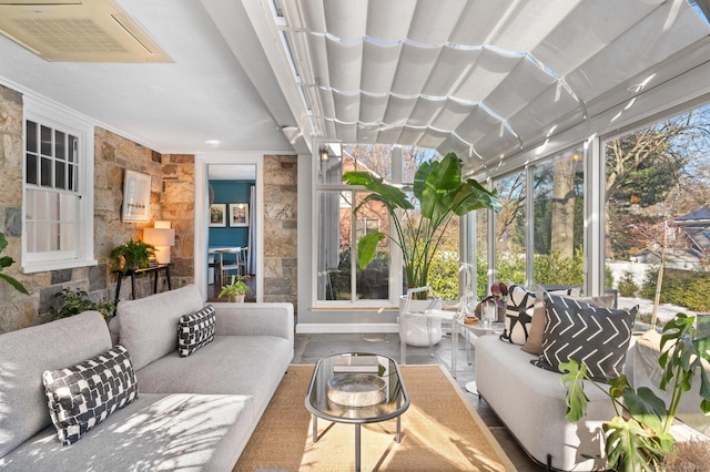 sunroom with plenty of natural light and visible vents