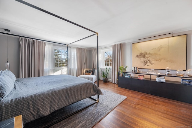 bedroom featuring wood finished floors