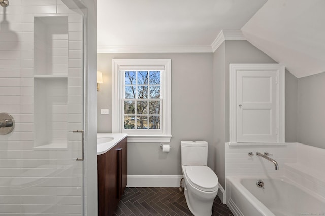 full bath with a garden tub, toilet, vanity, baseboards, and crown molding