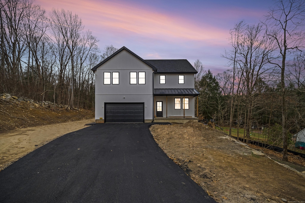 20 Denison Rd, Somers, CT 06071 - modern farmhouse style home featuring a porch and a garage