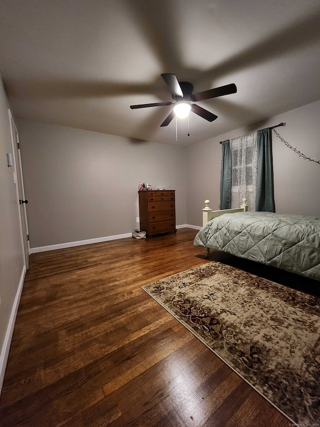 unfurnished bedroom with hardwood / wood-style flooring and ceiling fan