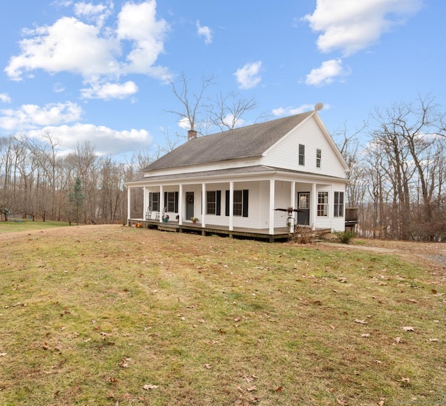 view of front of home featuring a front lawn and a porch