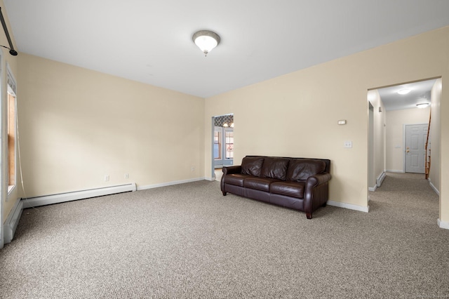 living area with carpet flooring and baseboard heating