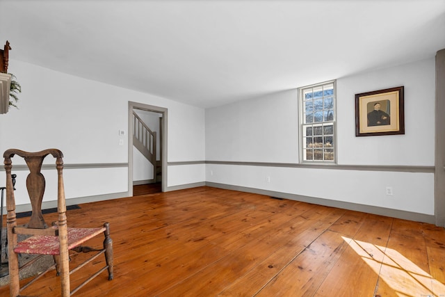 empty room featuring wood-type flooring