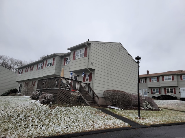 view of front of home with a deck