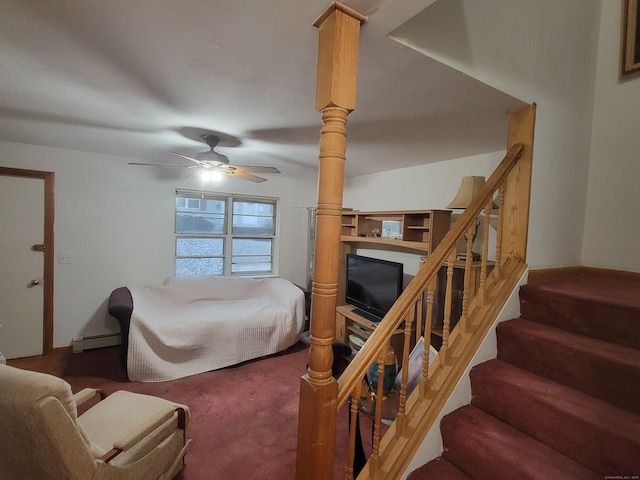 bedroom featuring carpet floors, baseboard heating, and ceiling fan