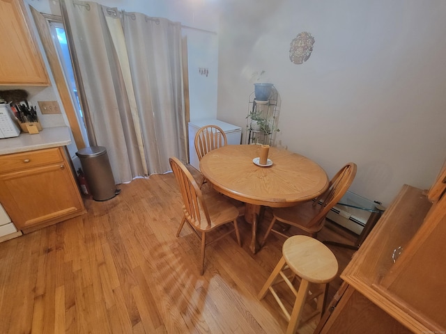 dining room featuring light hardwood / wood-style flooring