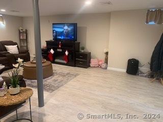 living room with wood-type flooring