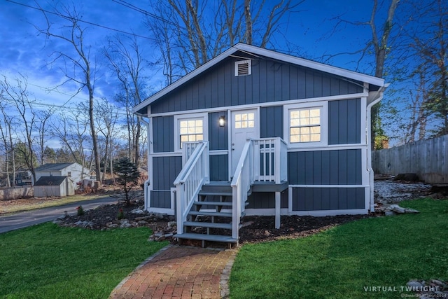 view of front of house with a front lawn