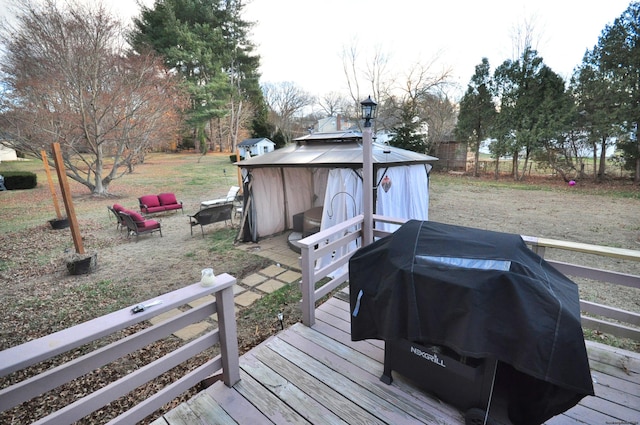 deck with a gazebo and a grill