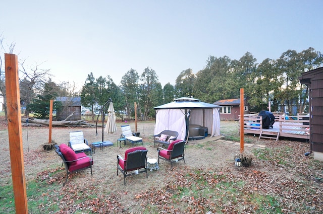 view of yard with a wooden deck