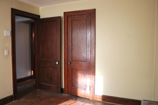 hall featuring dark hardwood / wood-style flooring