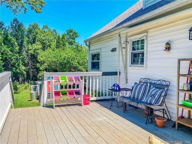 wooden deck with an outdoor hangout area