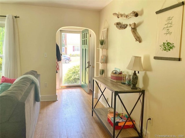 doorway to outside featuring hardwood / wood-style flooring