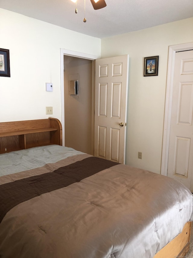 bedroom featuring ceiling fan