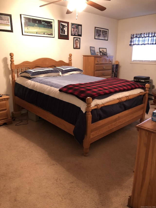 bedroom featuring carpet and ceiling fan