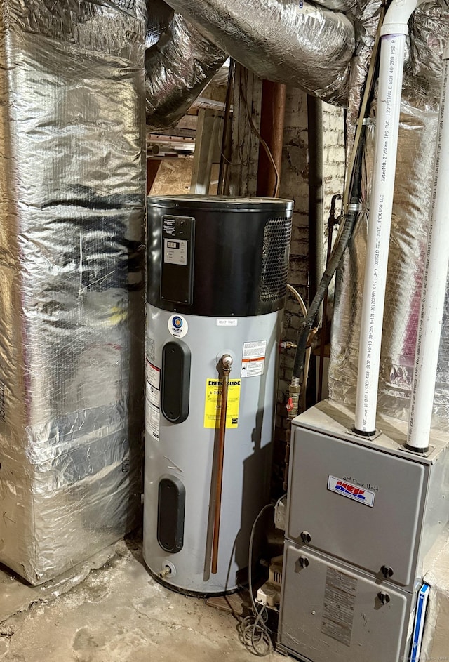 utility room featuring water heater