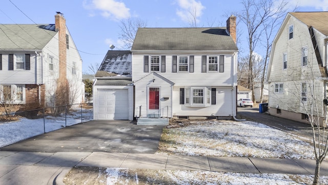 colonial-style house with a garage