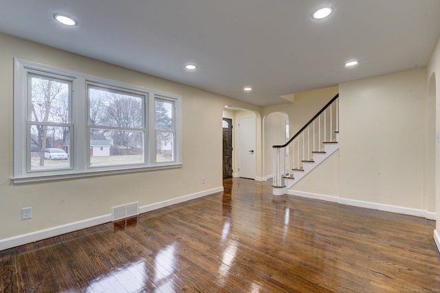 interior space with dark hardwood / wood-style flooring