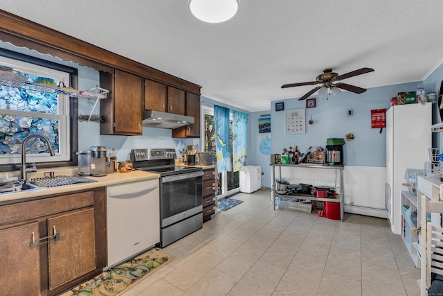 kitchen with stainless steel electric stove, a textured ceiling, sink, and white dishwasher