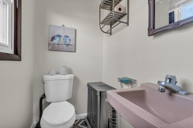 bathroom with sink and toilet