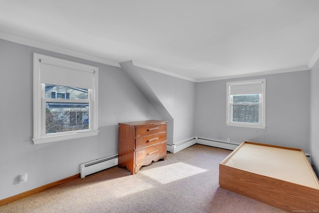 additional living space with light carpet and a baseboard radiator