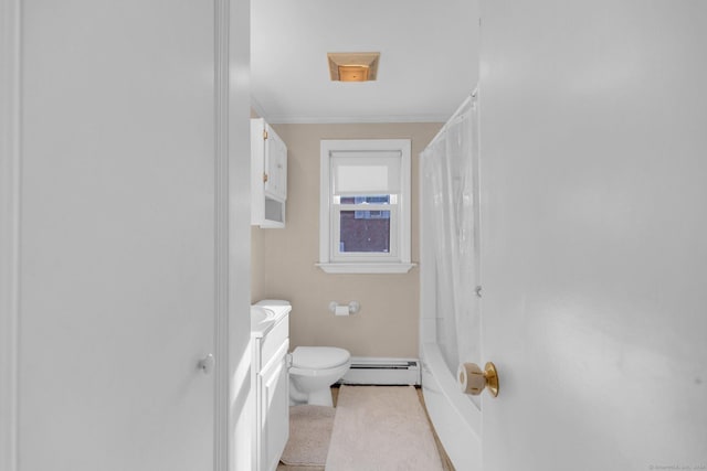 bathroom featuring vanity, toilet, and baseboard heating