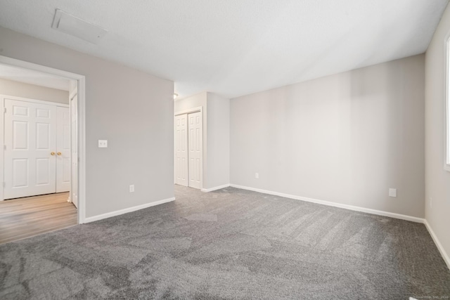 empty room featuring carpet flooring