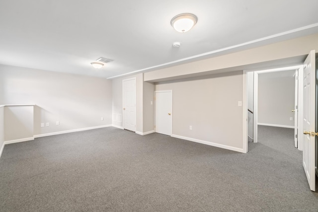 basement with dark carpet