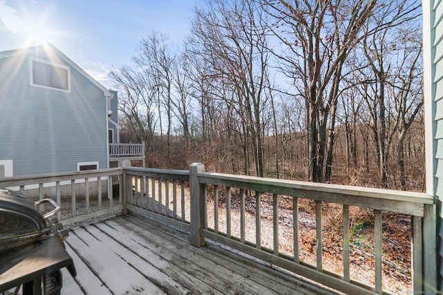 wooden deck with grilling area