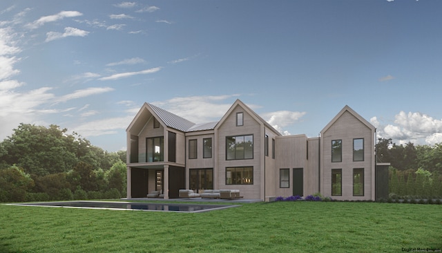 rear view of house with a lawn and an outdoor living space