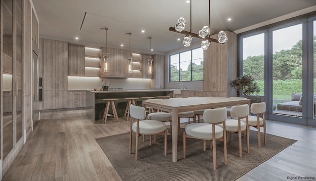 dining space featuring light wood-type flooring, plenty of natural light, and wooden walls