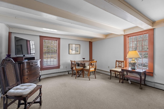 living area featuring a baseboard radiator, beam ceiling, and carpet floors