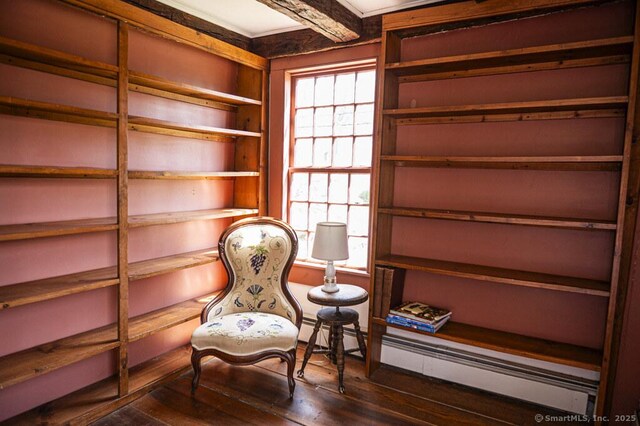 131 Cow Hill Rd, Clinton, CT 06413 - living area featuring dark wood finished floors and a baseboard heating unit