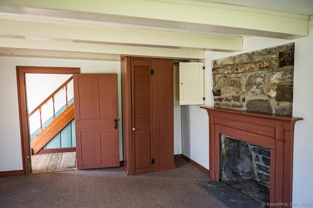 131 Cow Hill Rd, Clinton, CT 06413 - unfurnished living room with a fireplace with flush hearth, baseboards, stairs, and carpet