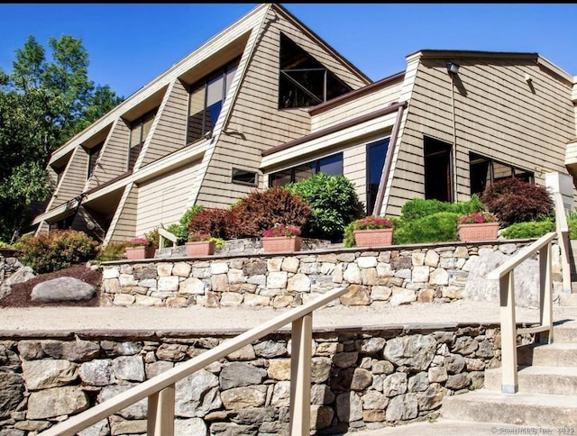 213 Ledge Dr Unit 213, Torrington, CT 06790 - view of side of home featuring stairs