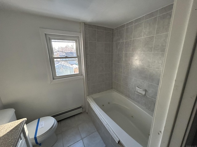 full bathroom with tile patterned floors, vanity, tiled shower / bath combo, a baseboard heating unit, and toilet