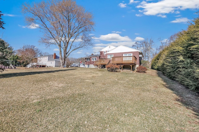 view of yard featuring a deck