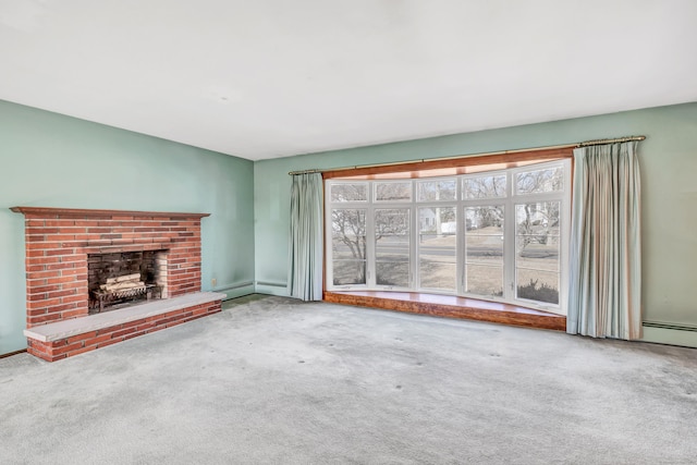 unfurnished living room featuring carpet flooring, a fireplace, and baseboard heating