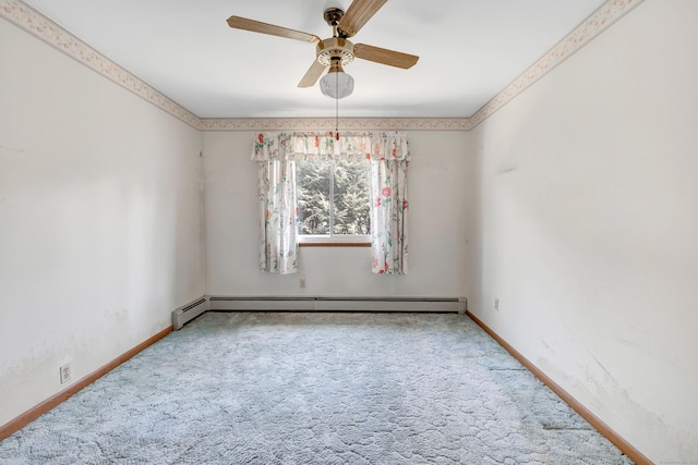 carpeted empty room featuring a baseboard heating unit, baseboards, and a ceiling fan