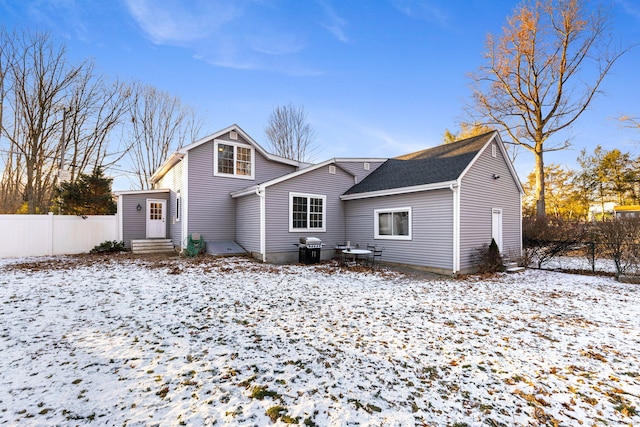 view of snow covered property