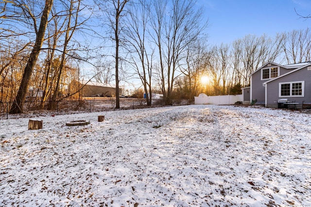 view of yard covered in snow