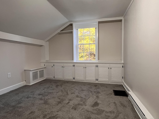 bonus room with baseboard heating, vaulted ceiling, and dark colored carpet