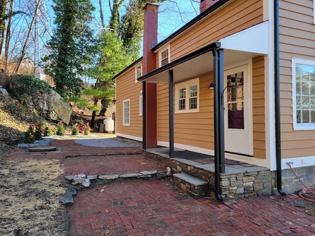 view of property exterior featuring a patio